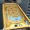 Genco Criss Cross A-Lite, the first pinball game with an illuminated backglass.