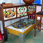 Mike Maxwell incorporates pinball machine parts into his fine furniture.