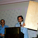 Joe Kaminkow holds a virgin playfield, while Ed Cebulas watches.