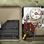 Inside the Magic Fingers timer and coin box.
