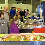 Early shoppers examine the games for sale at the National Pinball Museum.