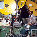 Punch press operation at the Williams Pinball Factory