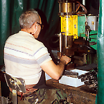 Pressing components together at the Williams Pinball Factory