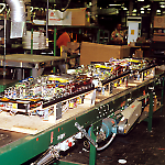 Rejected Taxi playfields await repair at the Williams Pinball Factory