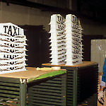 Completed Taxi game toppers at the Williams pinball factory